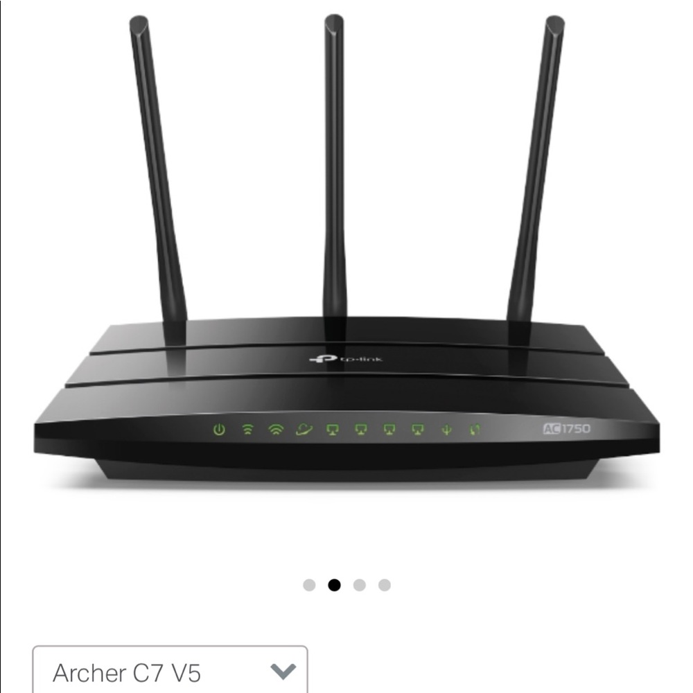 Used electronic equipment, Black TP-Link AC1750 router.